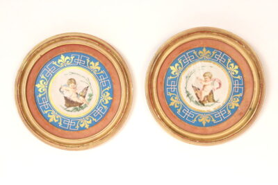 Pair of framed porcelain rondels