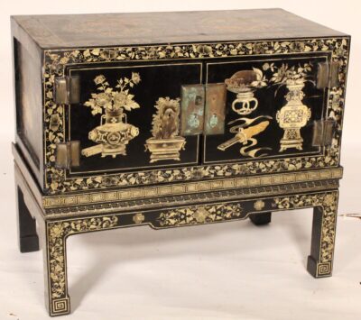 Chinese Black Lacquer and Gilt Decorated Cabinet on Stand